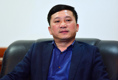 Chánh văn phòng Ban tổ chức Trung ương Hoàng Trọng Hưng trả lời phỏng vấn VnExpress sáng 24/1. Ảnh: Giang Huy